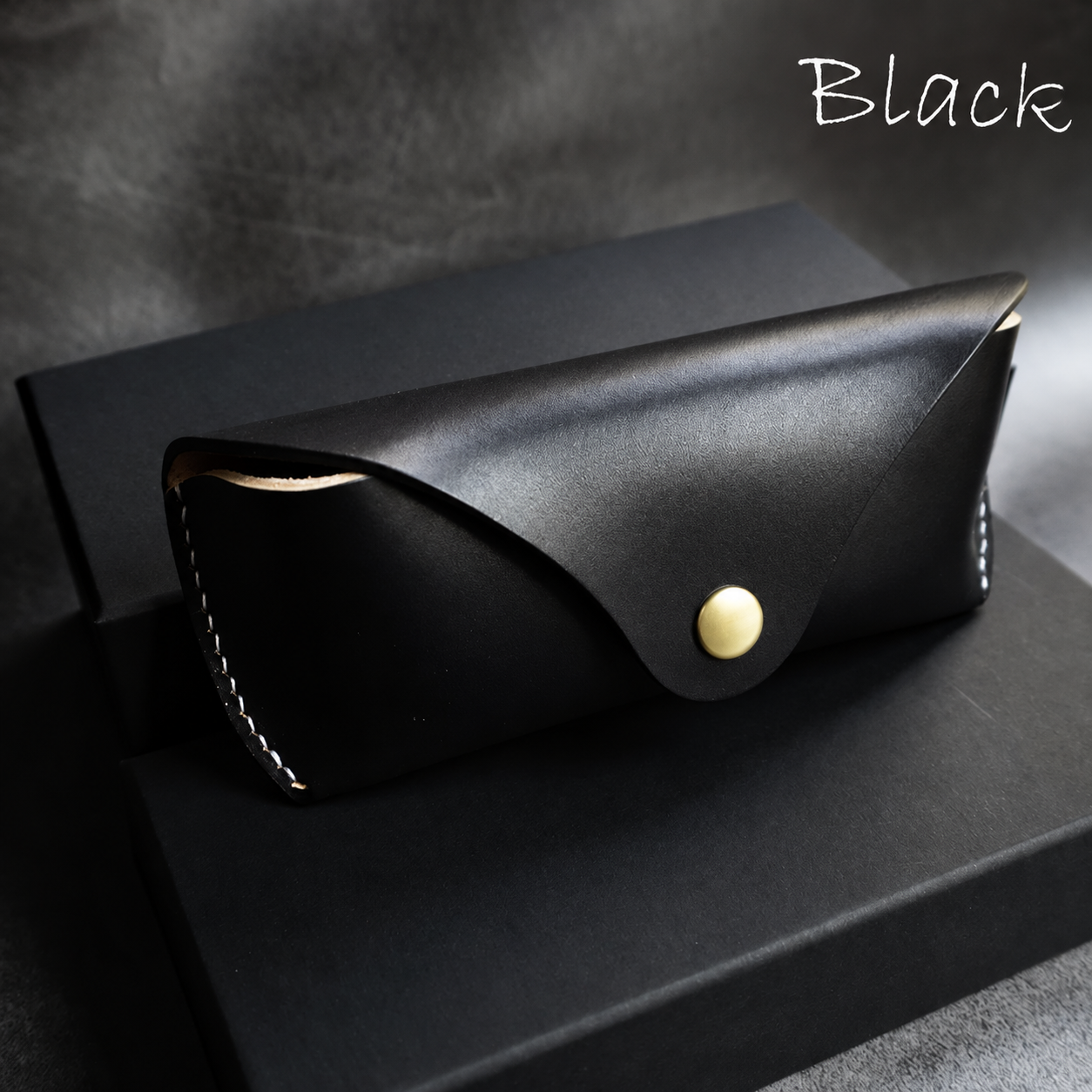 Glasses case — black · envelope flap